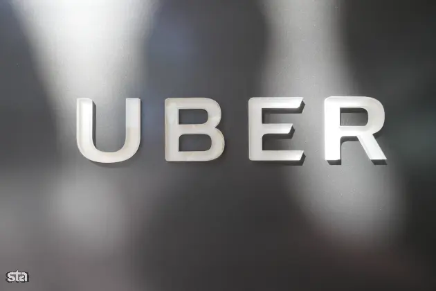 ZDA, San Francisco. Ameriško podjetje za posredovanje prevozov Uber, logotip. Foto: dpa/STA Arhiv dpa/STA